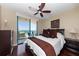 Relax in this main bedroom with a private balcony overlooking the scenic ocean at 1540 Gulf Blvd # 2102, Clearwater Beach, FL 33767