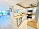 Well-equipped kitchen with granite countertops and stainless steel appliances, ideal for cooking and entertaining at 2618 Gulf Blvd # 505, Indian Rocks Beach, FL 33785