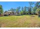 View of house from the spacious backyard at 3208 King William Cir, Seffner, FL 33584