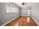 Bright bedroom with hardwood floors, and private balcony access at 341 5Th S St # 4, St Petersburg, FL 33701