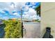 View of the community pool from the walkway at 2391 Sumatran Way # 55, Clearwater, FL 33763