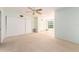 Bright bedroom with neutral carpeting, large closet and window with blinds at 2391 Sumatran Way # 55, Clearwater, FL 33763
