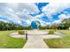 Large globe in landscaped circular area at 2391 Sumatran Way # 55, Clearwater, FL 33763