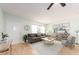 Bright living room with light flooring, featuring a comfy sofa and stylish decor at 2391 Sumatran Way # 55, Clearwater, FL 33763