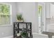 Stylish bar area with a black metal shelving unit at 2430 6Th N Ave, St Petersburg, FL 33713