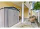 Small patio with storage shed and wicker chairs at 2430 6Th N Ave, St Petersburg, FL 33713