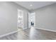 Light and airy bedroom with wood-look floors and access to bathroom at 2430 6Th N Ave, St Petersburg, FL 33713