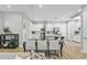 Modern kitchen with white cabinets, a large island, and stainless steel appliances at 2430 6Th N Ave, St Petersburg, FL 33713