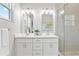Bright bathroom with double vanity and a large walk-in shower at 2430 6Th N Ave, St Petersburg, FL 33713