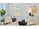 Comfortable sitting area with a plush armchair and side table at 2430 6Th N Ave, St Petersburg, FL 33713
