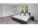 Spacious bedroom with built-in shelving and large windows at 2430 6Th N Ave, St Petersburg, FL 33713