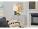 Living room fireplace with decorative mantel and artwork at 2430 6Th N Ave, St Petersburg, FL 33713