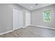 Bright bedroom with double closets and wood-look floors at 2430 6Th N Ave, St Petersburg, FL 33713