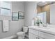 Clean bathroom with white vanity and frameless mirror at 2430 6Th N Ave, St Petersburg, FL 33713