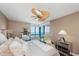 Spacious bedroom with ocean view, large bed, and comfortable seating at 1540 Gulf Blvd # 2102, Clearwater Beach, FL 33767