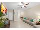 Spacious living room with neutral decor and plenty of natural light at 7203 Sweet Alyssum Ct, Tampa, FL 33619