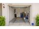 Attached garage with storage space and bicycle rack at 7203 Sweet Alyssum Ct, Tampa, FL 33619