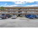 View of Willow Lake Condominiums, 6400 building, with parking at 6400 46Th N Ave # 117, Kenneth City, FL 33709