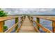 Wooden dock extending over calm water at 2313 Sunset Wind Loop, Oldsmar, FL 34677