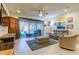 Living area features a comfortable seating arrangement and a large TV at 2313 Sunset Wind Loop, Oldsmar, FL 34677