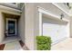 Townhouse garage and entryway at 2313 Sunset Wind Loop, Oldsmar, FL 34677