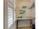 Small home office with workspace and built-in shelving at 2313 Sunset Wind Loop, Oldsmar, FL 34677