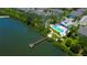 Community pool and lakefront dock at 2313 Sunset Wind Loop, Oldsmar, FL 34677