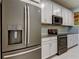 Sleek kitchen with stainless steel appliances at 2313 Sunset Wind Loop, Oldsmar, FL 34677