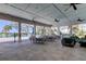 Covered patio overlooking the pool and waterfront at 2313 Sunset Wind Loop, Oldsmar, FL 34677