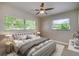 Bright bedroom with a large bed and plenty of natural light at 161 Overbrook W St, Largo, FL 33770