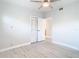 Spacious bedroom featuring light flooring and built-in closet at 161 Overbrook W St, Largo, FL 33770