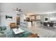 Open living room with modern furniture and kitchen at 161 Overbrook W St, Largo, FL 33770