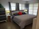 Calm bedroom with a comfortable bed, soft lighting, and elegant decor for a restful retreat at 5 158Th Ave, Redington Beach, FL 33708