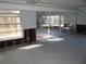 Spacious living room with large windows and sliding glass doors leading to patio at 5 158Th Ave, Redington Beach, FL 33708