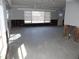 Open living area with damage and exposed framing, needs renovation at 5 158Th Ave, Redington Beach, FL 33708