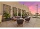 Stylish rooftop deck features lounge seating, lush greenery, and sleek design, perfect for relaxation at 540 N Tamiami Trl # 1702, Sarasota, FL 34236