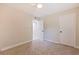 Bright bedroom with carpet flooring and neutral walls. Features a ceiling fan and ample closet space at 5733 66Th N Ln, St Petersburg, FL 33709