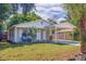 Newly renovated home with carport and landscaped yard at 5733 66Th N Ln, St Petersburg, FL 33709