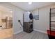 Stackable washer and dryer in a well-lit laundry room at 5733 66Th N Ln, St Petersburg, FL 33709