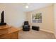Spacious bedroom with ceiling fan and large window at 5733 66Th N Ln, St Petersburg, FL 33709