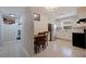 Bright kitchen with stainless steel appliances and white cabinets at 5733 66Th N Ln, St Petersburg, FL 33709