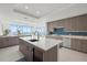 Gourmet kitchen with island, water views, and high-end finishes at 540 N Tamiami Trl # 1702, Sarasota, FL 34236