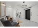 Modern entryway with contemporary seating and elevator access at 540 N Tamiami Trl # 1702, Sarasota, FL 34236
