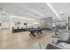 Modern game room featuring a pool table and bar area at 540 N Tamiami Trl # 1702, Sarasota, FL 34236