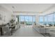 Modern dining room with large windows and city views at 540 N Tamiami Trl # 1702, Sarasota, FL 34236