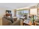 Spacious living room with comfy sofas and large windows at 36750 Us Highway 19 N # 15305, Palm Harbor, FL 34684
