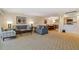 Open concept living room with adjacent dining and kitchen areas at 36750 Us Highway 19 N # 15305, Palm Harbor, FL 34684