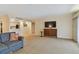 Living room with comfortable seating and a large TV at 36750 Us Highway 19 N # 15305, Palm Harbor, FL 34684