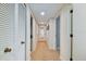 Clean hallway with carpet and multiple doors leading to rooms at 36750 Us Highway 19 N # 15305, Palm Harbor, FL 34684