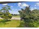 Expansive view of a lush green golf course at 36750 Us Highway 19 N # 15305, Palm Harbor, FL 34684